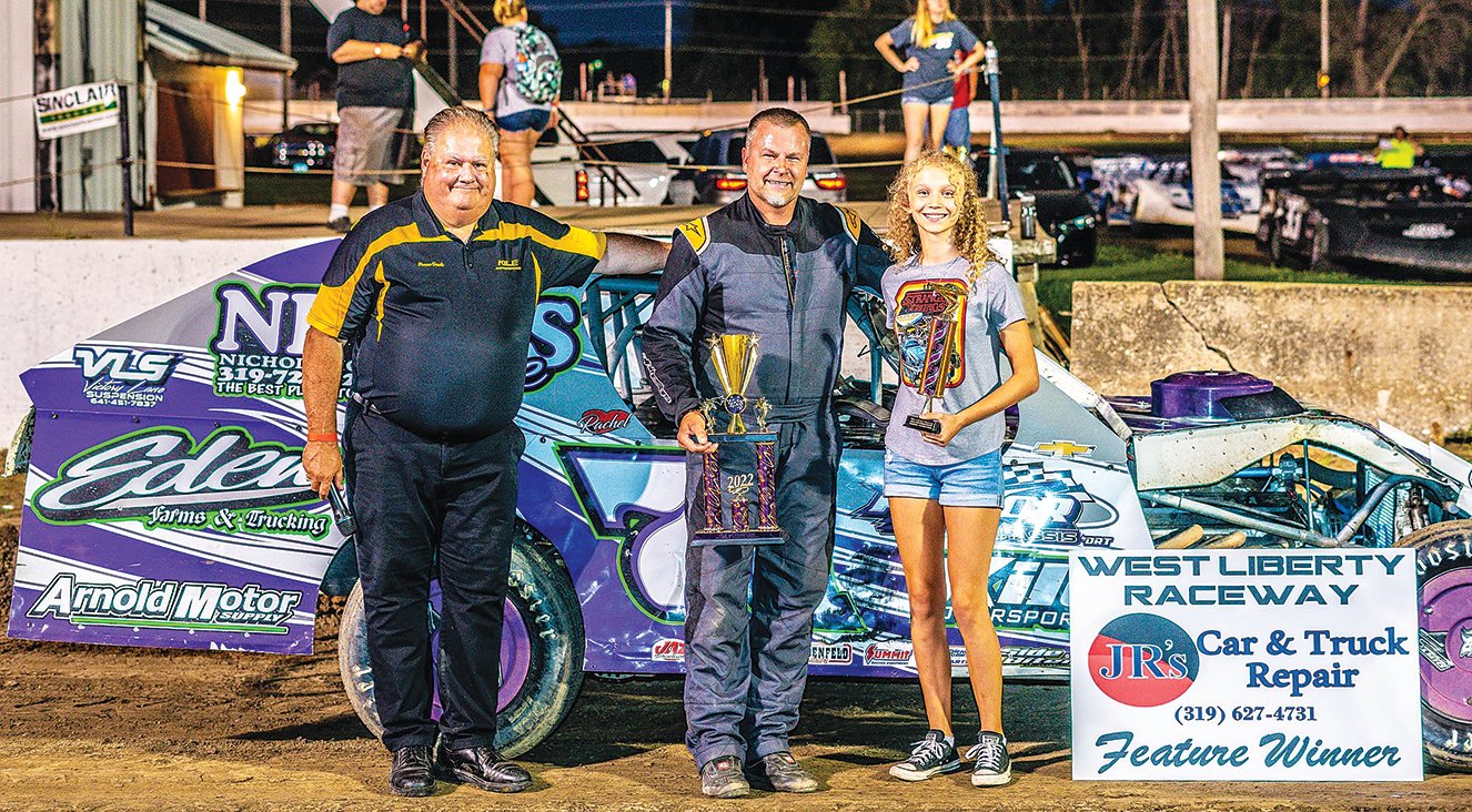 Pictured above is one of the featured winners from the West Liberty Raceway race July 9 in the Sports Modified Division with his daughter. The race on Aug. 6 will be the annual Back To School Night race.