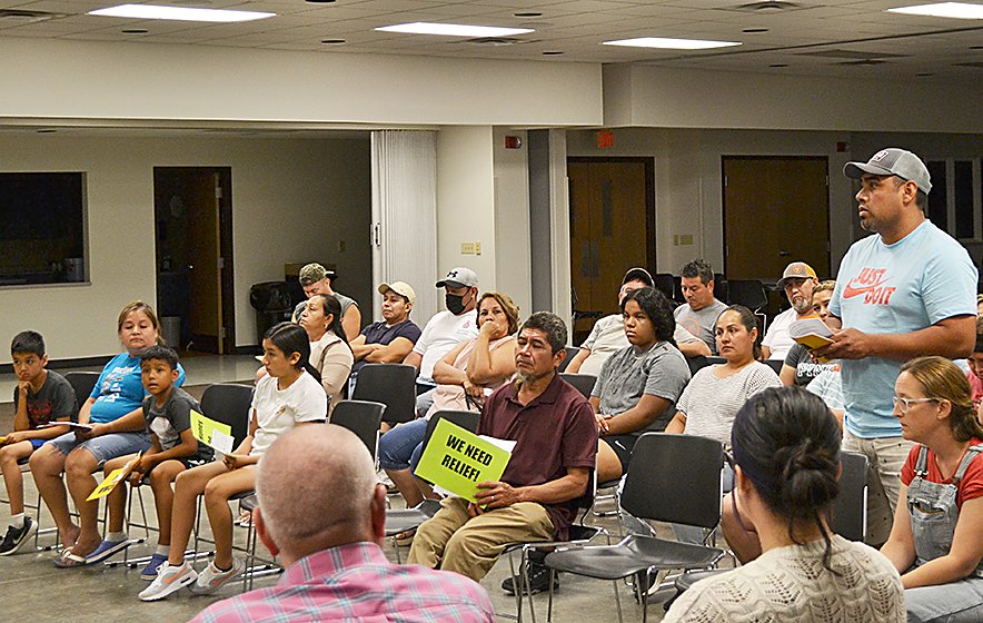 Edgar Velasquez, West Liberty resident and essential worker, asks the West Liberty City Council for answers on the proposal to give the ARPA funds to Escucha Mi Voz to distribute to essential workers who didn't qualify for government assistance during the pandemic .