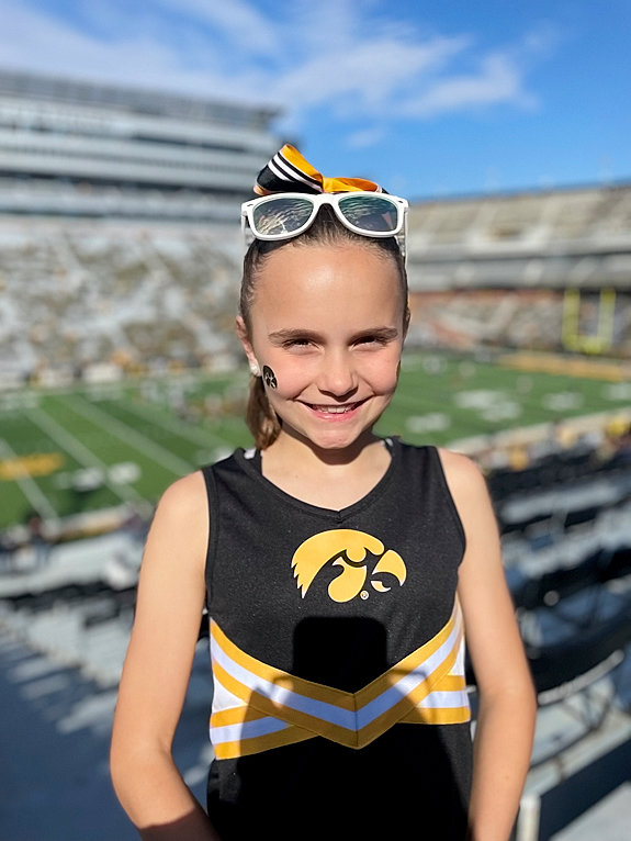 Kinley attended her first Iowa football game on Saturday, Oct. 1, when the Hawkeyes played Michigan, and she was able to participate in The Wave on the five-year anniversary of being diagnosed with leukemia.