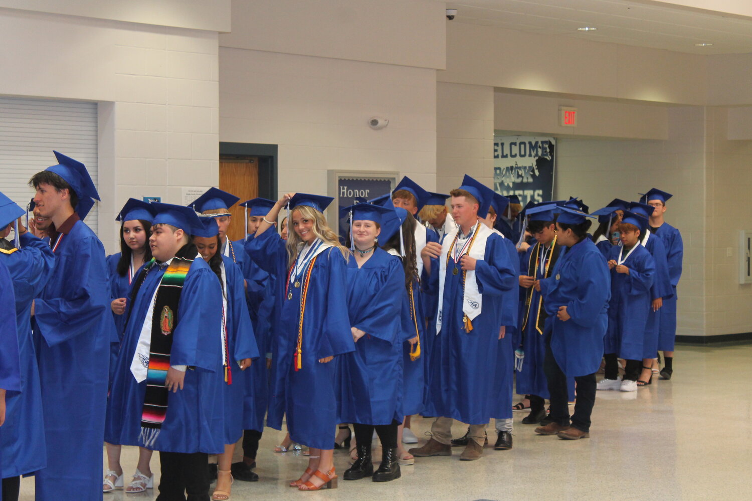 Seniors line up to march in to the gym for their graduation ceremony Sunday, May 28.