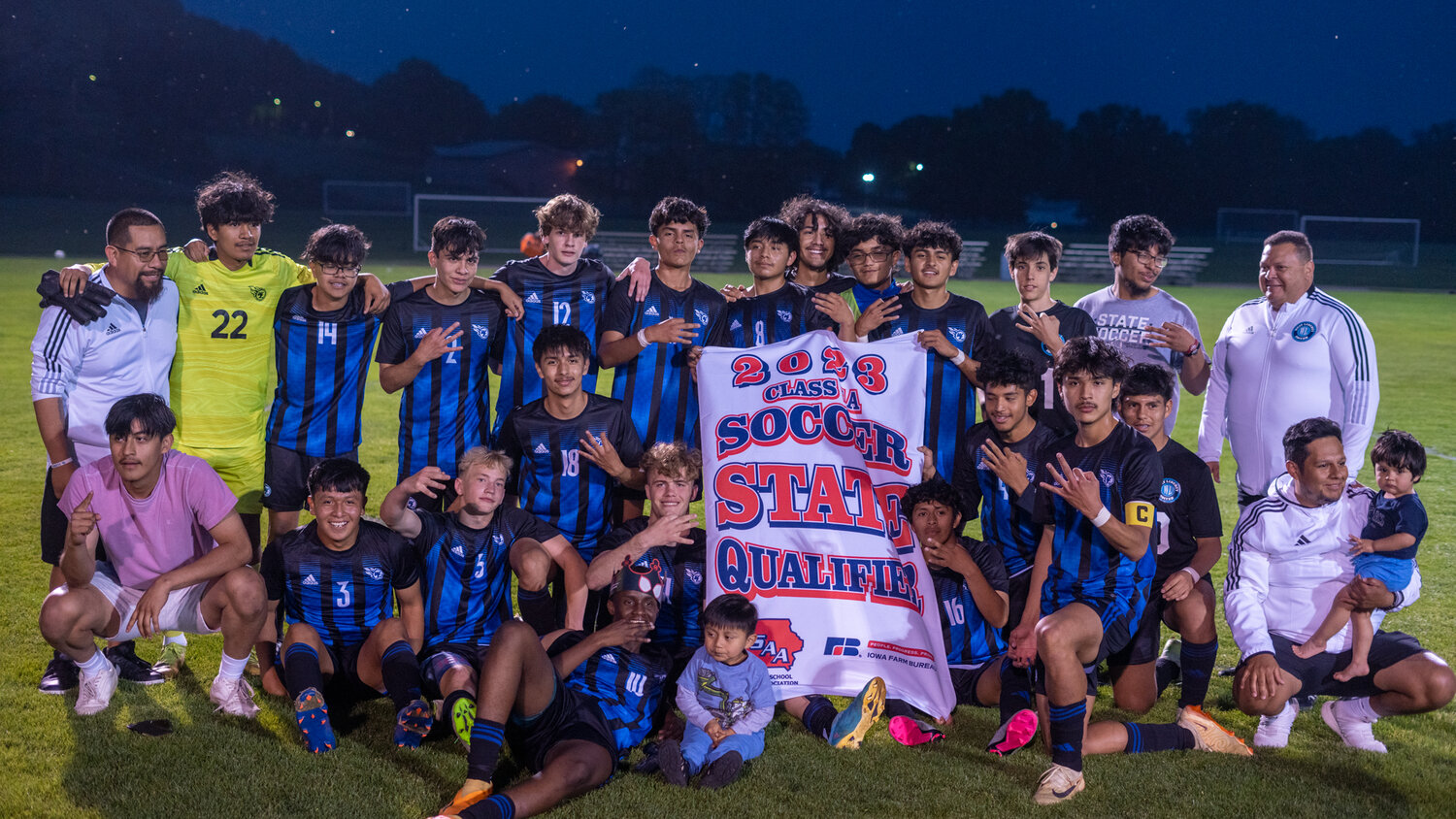 The Comets  players and coaches pose with their 2023 class 1A banner after their state qualifying soccer game last week.
