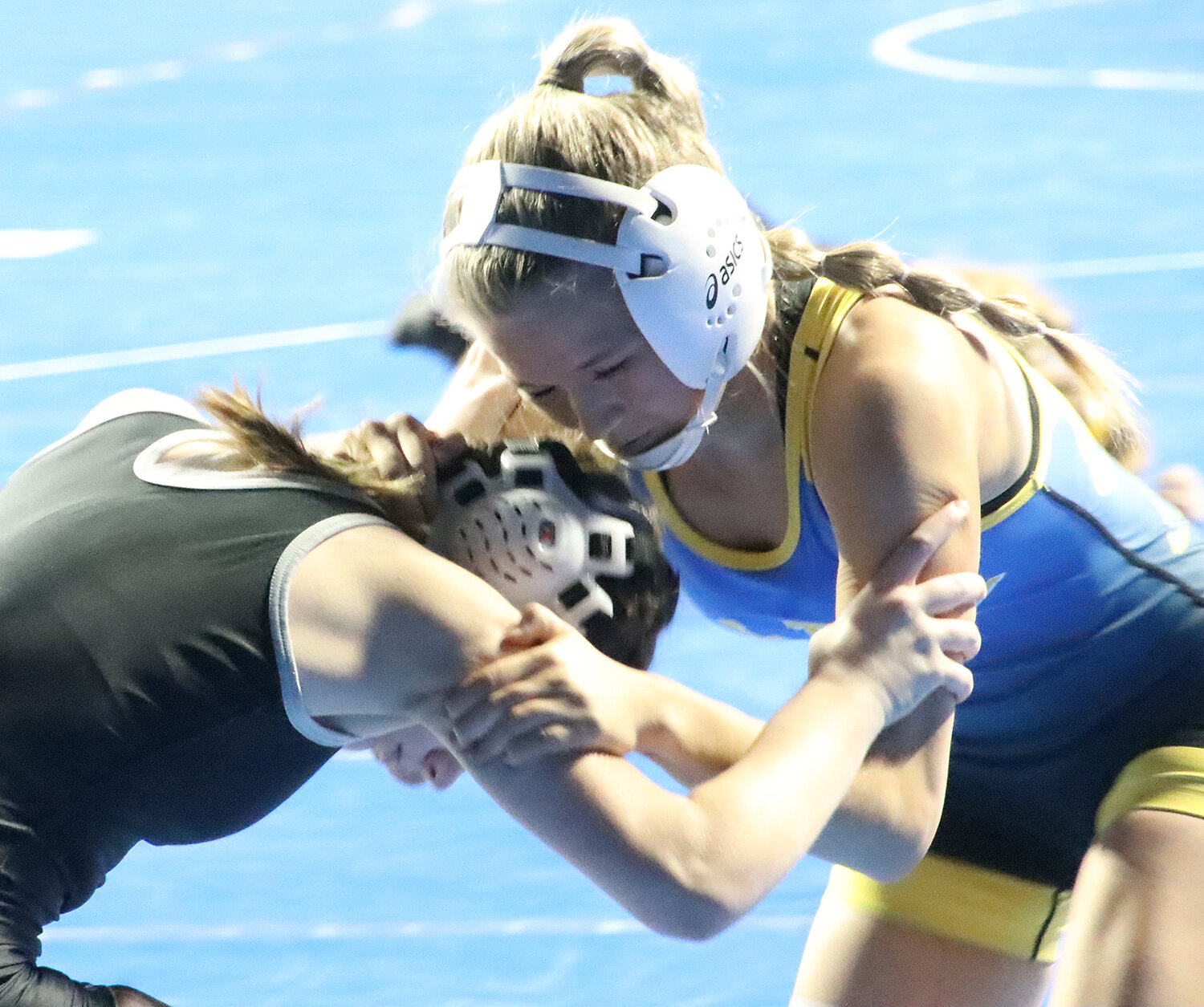 Wilton sophomore Audra Coss clinched a spot in the state tournament via the 110-pound weight class