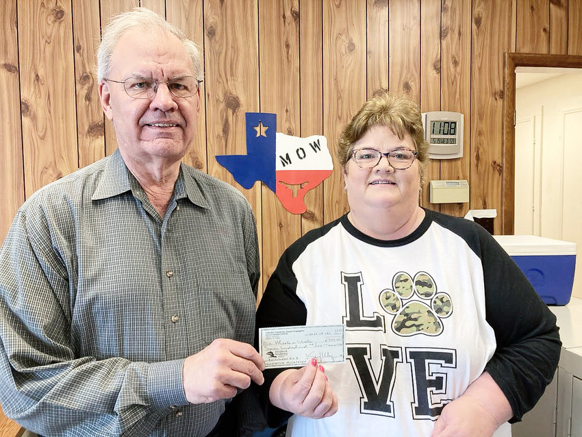 Zion Lutheran Church Ken May presented a check to Evelyn West, Director of Pampa Meals on Wheels.