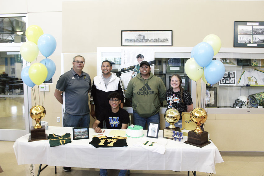 Angel Bejarano with coaches, from left, Dwayne Dotson, Hugo Aguillon, Martin Moreno and Meganne Salazar.