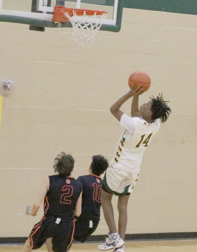 #14, Kaviontra Branch goes for a layup against Dumas