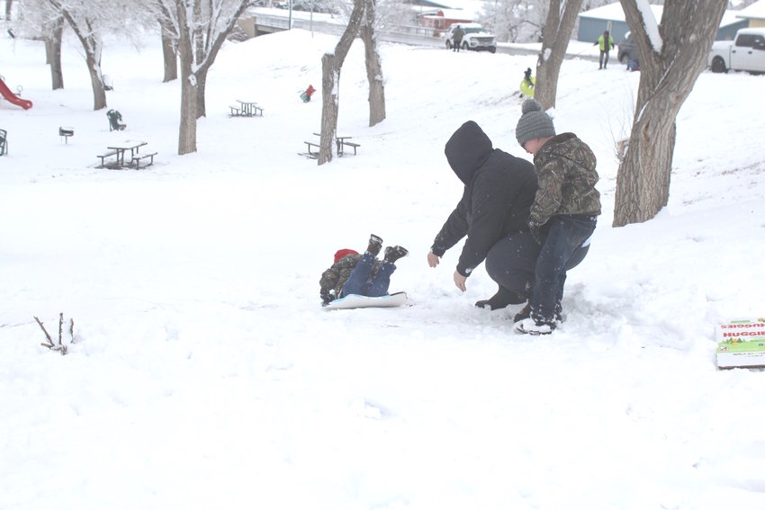Parker Family sledding at Central Park