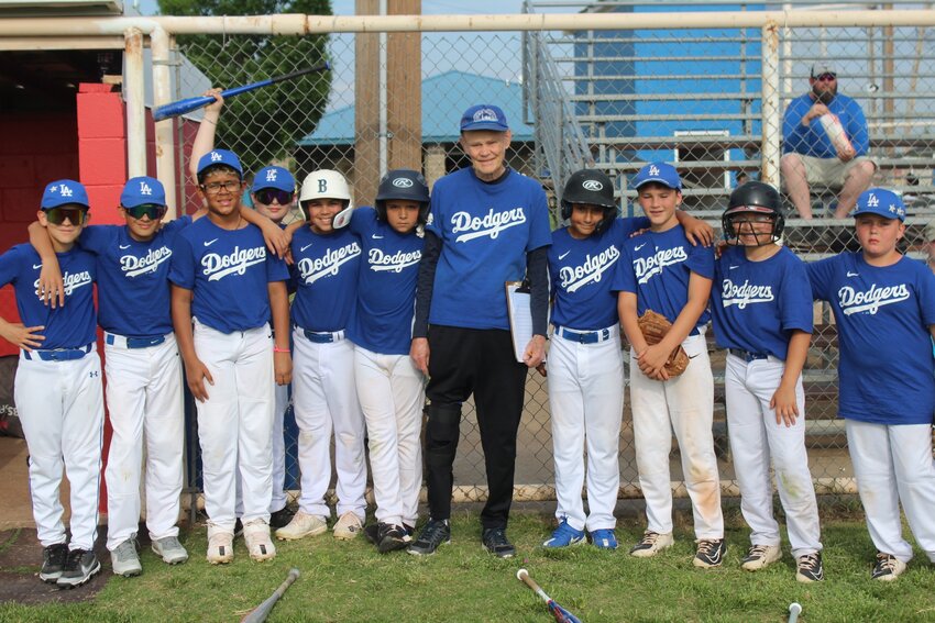 Coach Warner with the 2023 Glo-Valve Service Dodgers