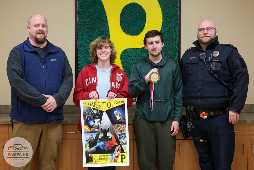 PHS Crime Stoppers Coordinator and Sponsor Shawn Moore, PHS Artist Wyatt Johnson, Treasurer of PHS Crime Stoppers Brayden Bowley, and School Resource Officer Geoff Bowley