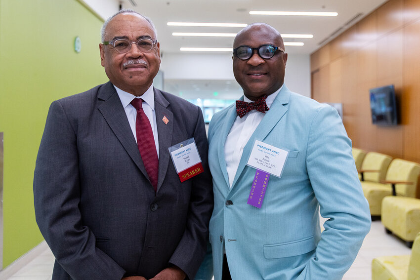 Cone Health Equity Summit Keynote Speaker Dr. Ron Wyatt (left) and Dr. Olu Jegede, chairperson of the Cone Health Equity Summit and vice president of Clinical Care-Health Equity at Cone Health. Photo Ivan Saul Cutler/Carolina Peacemaker.