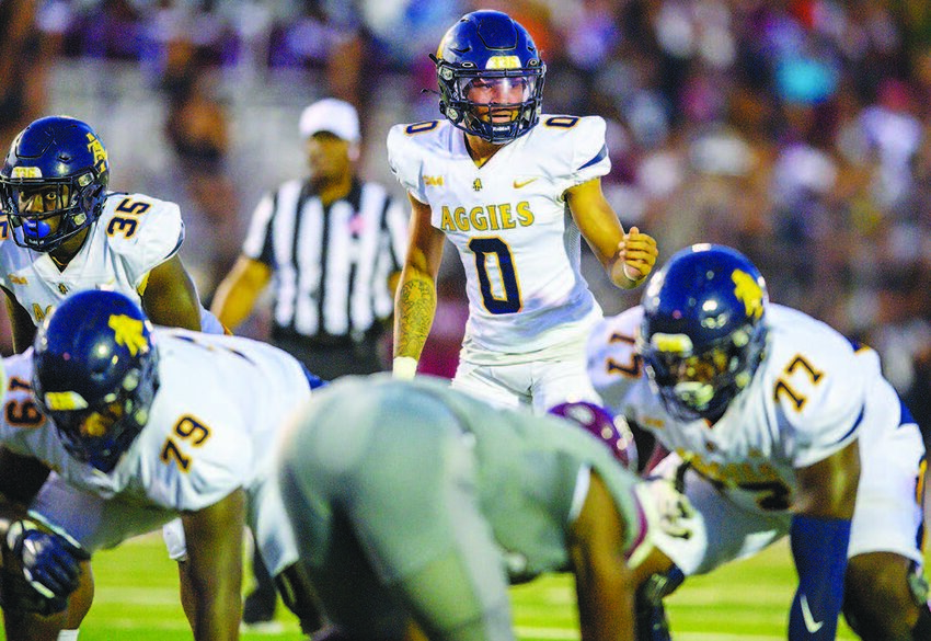 NCA&TSU quarterback Kevin White (#0) prepares for a play at the line of scrimmage against the N.C. Central Eagles during the Aggie Eagle Classic in Durham.