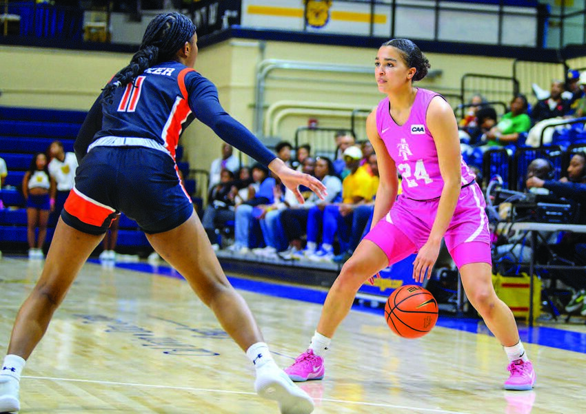 A&T guard Maleia Bracone (grad. student) posts up against a Western Carolina player.