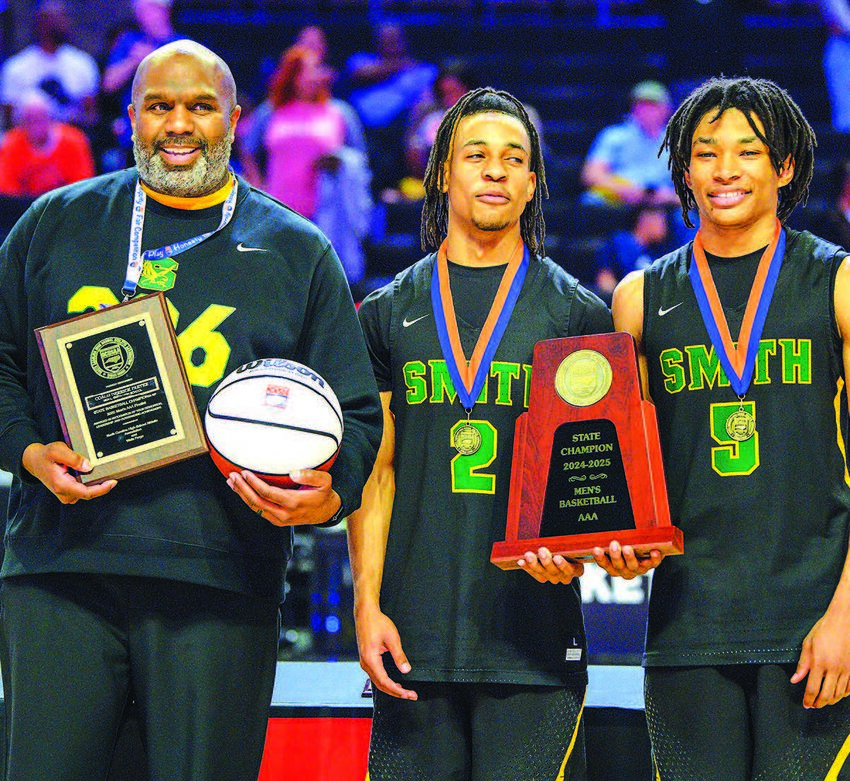 Smith Head Coach Derrick Partee is all smiles with team captains Micah Cowan (#2) and Tayshawn Mann (#5).