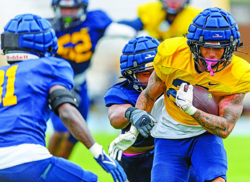 A&T running back Cameren Dalrymple (#23) tries to break loose during this year’s “Spring Game.”