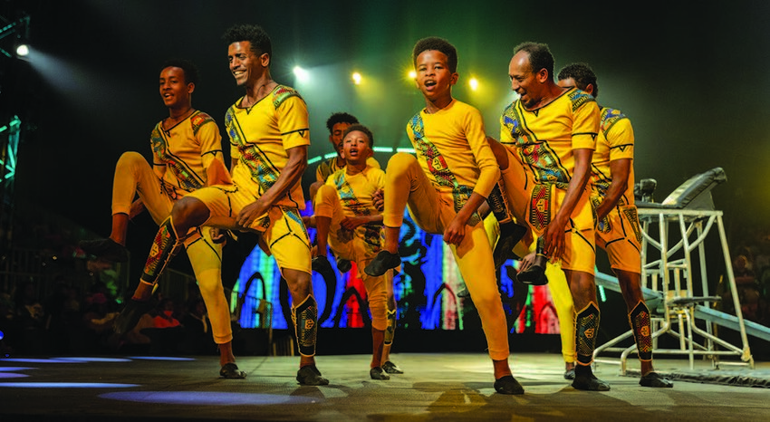 An acrobatic dance troupe struts its stuff at the UniverSoul Circus.
