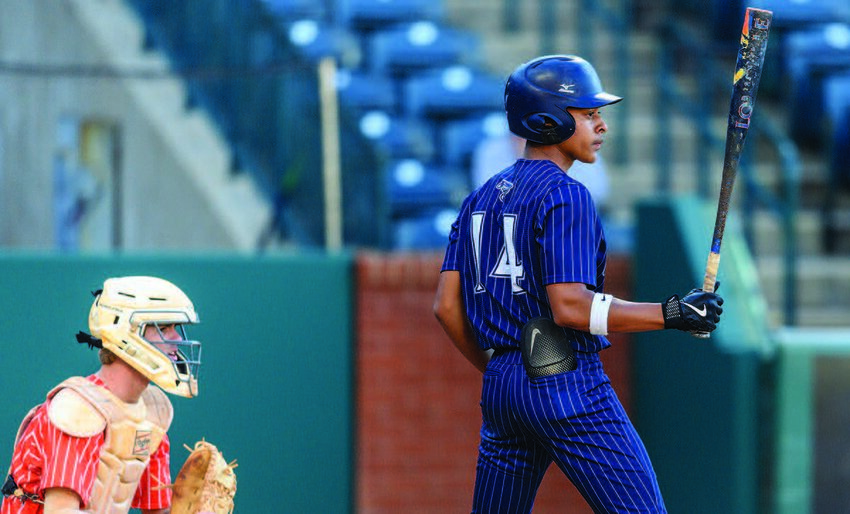 Levi Ponder (#14) steps to the plate versus Davie County.