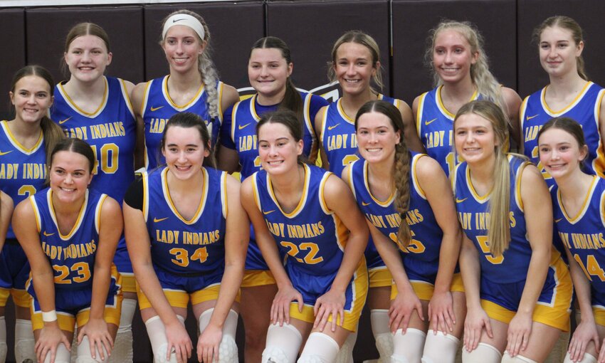 The St. Vincent girls basketball team poses after beating Neelyville 64-39 in the Class 2 state quarterfinals Saturday on the road.