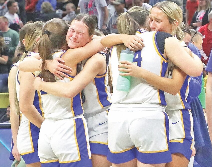 St. Vincent players embrace on the court after Saturday's 53-45 loss to defending champion Skyline in the Missouri Class 2 girls' basketball state championship in Columbia. It was St. Vincent's first trip to the final, which came after defeating St. Paul Lutheran 59-28 on March 4, Nellyville 64-69 on March 8 and Tipton 56-50 in Friday's semifinal round.