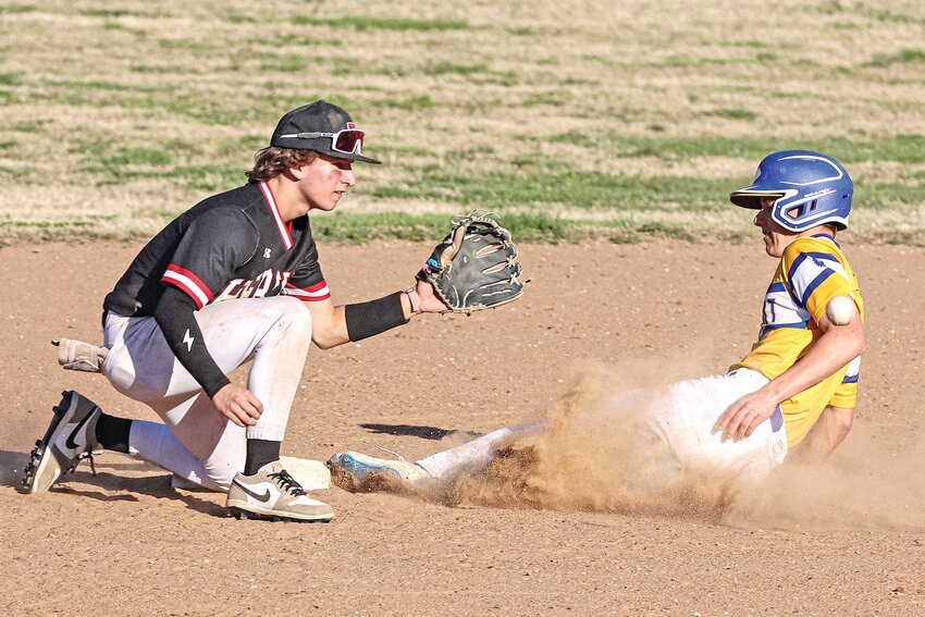 St. Vincent’s Andrew Hotop beats the throw to second during a game against Herculaneum on April 15. The Indians (5-7) entered the Easter break on a three-game skid.