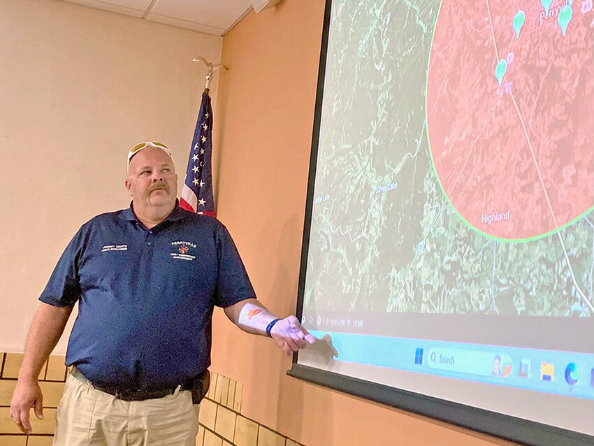 St. Vincent de Paul’s Head of Schools Zachary Stobart (left) speaks to Perry County Sheriff Jason Klaus during the Sept. 23 meeting.