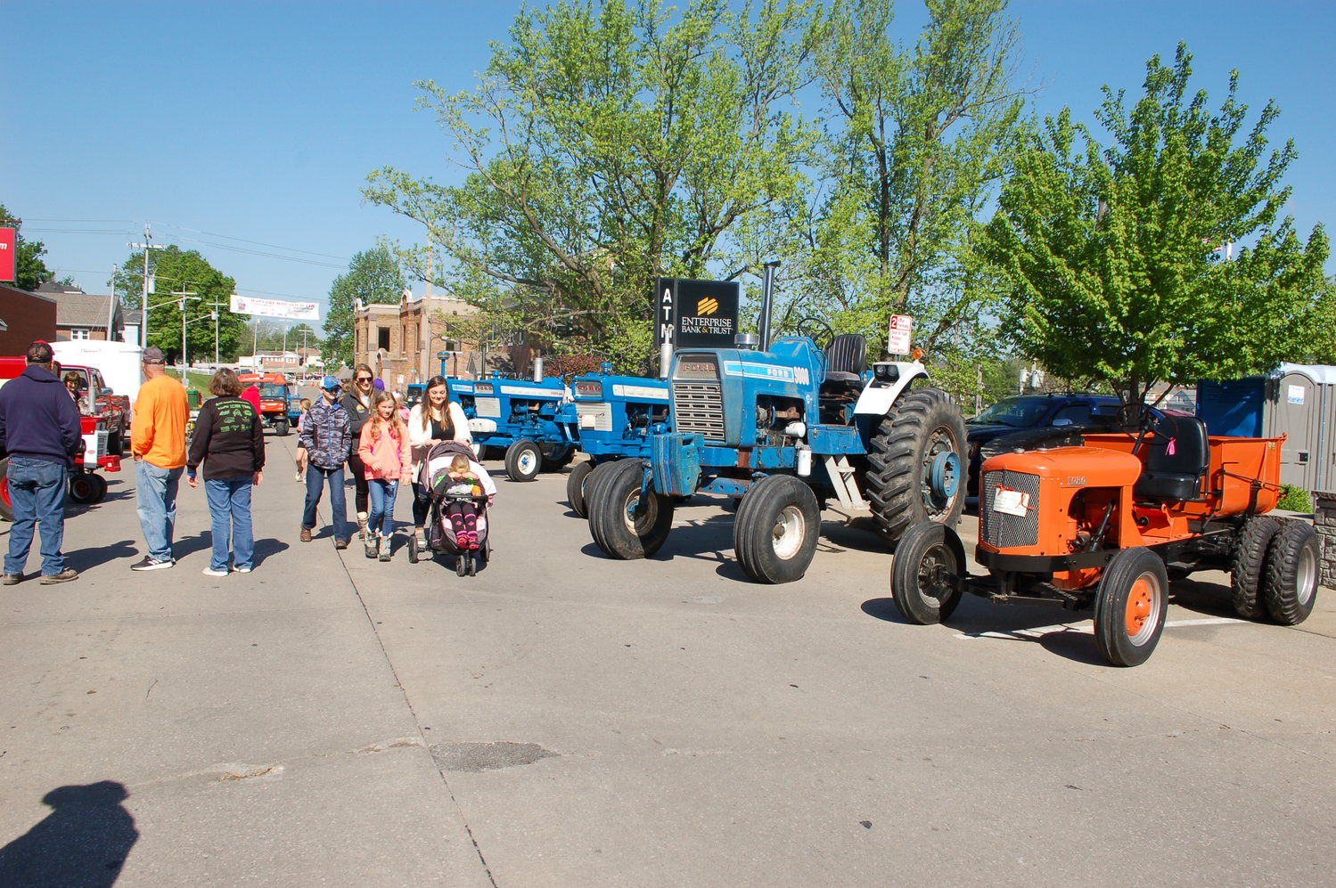 Several individuals check out the Mayfest tractor show Saturday, May 7.