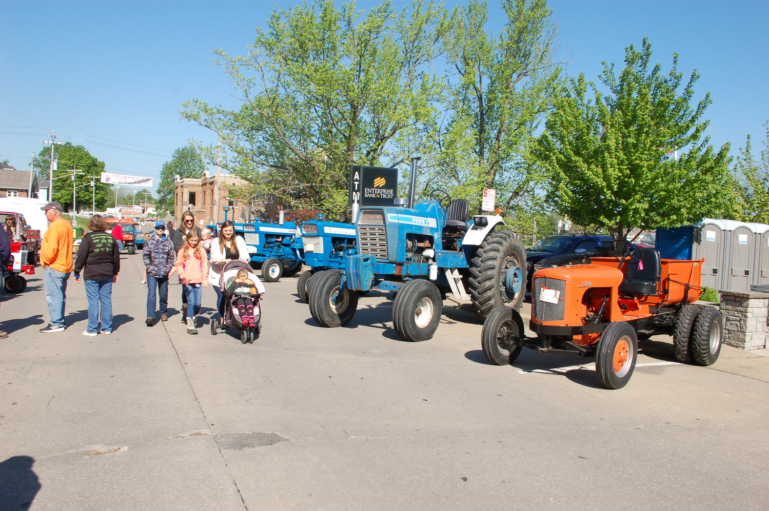 Several individuals check out the Mayfest tractor show Saturday, May 7.