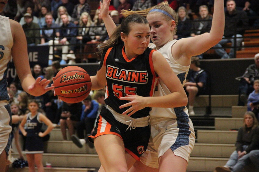 Freshman Teia Dube drives past a Lynden Christian defender during the first quarter of Blaine’s second round district playoff game on February 7.