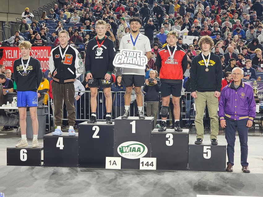 Senior Cal Fitzgerald (second from left) finished fourth in the 1A 144-pound division. Fitzgerald, along with Victor Gervol and Lucy Dahl, earned podium finishes for Blaine on February 17.