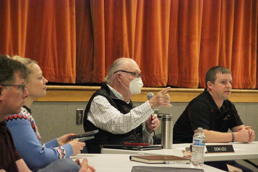 From l.; Blaine school board members Ben Lazarus, Erika Creydt, Don Leu and Ryan Ford at a special school board meeting on budget planning in the Blaine Middle School cafeteria February 20.