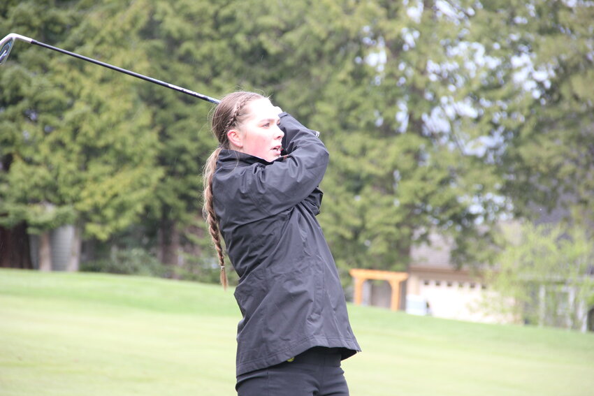 Blaine golfer Kijah Van Rijswijck watches her approach shot at Semiahmoo Golf and Country Club on March 25. Van Rijswijck shot a 59, placing 15th in a field of 42 golfers.