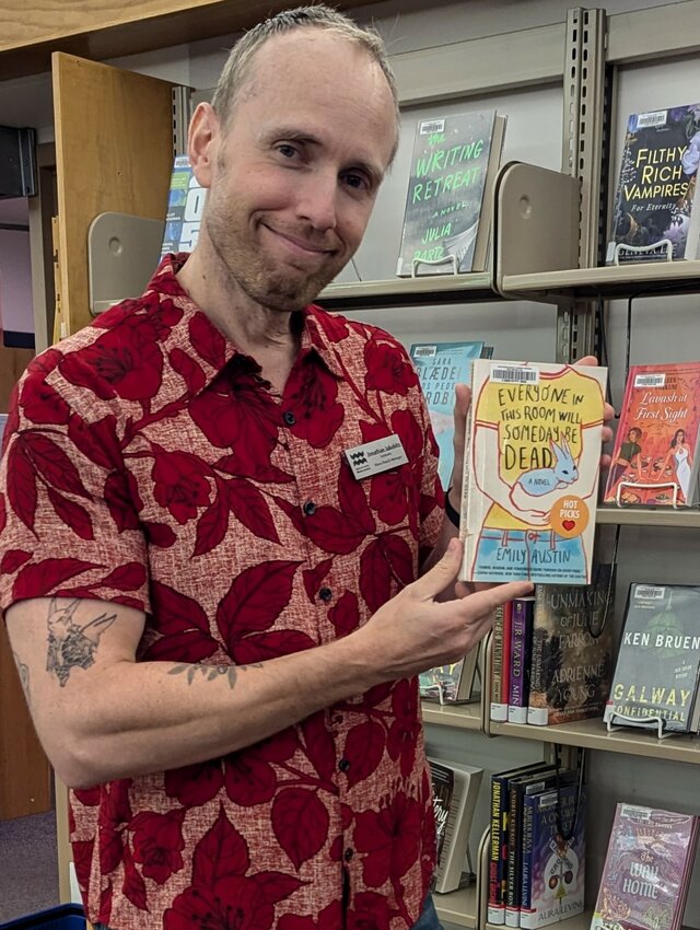 Blaine library branch manager Jonathan Jakobitz holds 