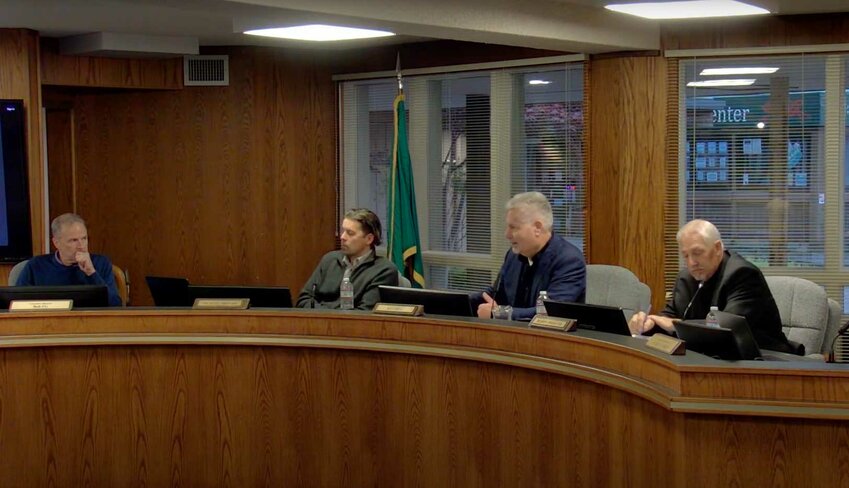 From l.; Port of Bellingham executive director Rob Fix and commissioners Michael Shepard, Ken Bell and Bobby Briscoe during the October 15 Port of Bellingham meeting.