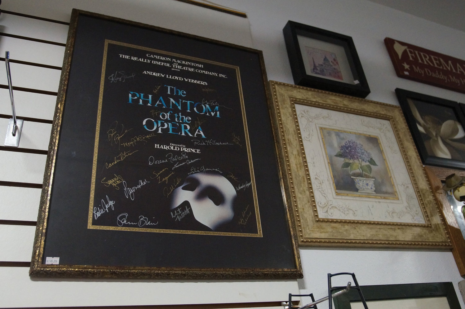 A Phantom of the Opera poster signed by the Broadway cast at Third Time’s A Charm Thrift, in Birch Bay.