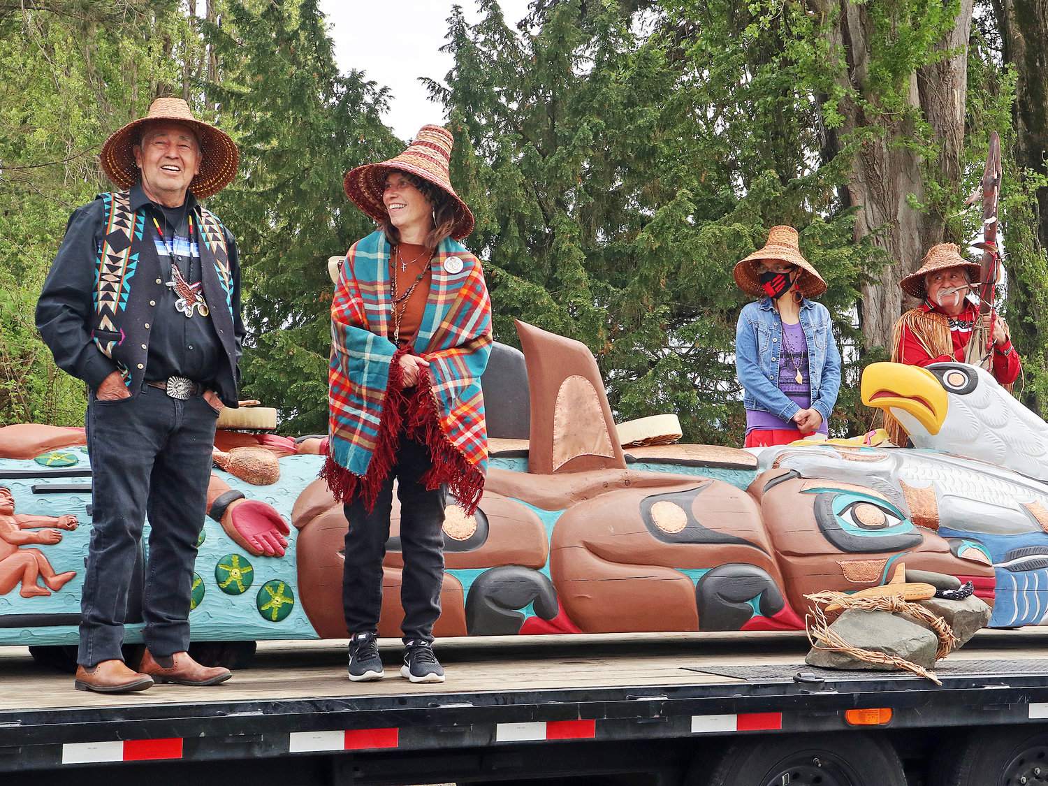 From l.; Douglas James, Siam’el wit, Heather Misanes and Jewell James are members of the Lummi Nation who helped carve and paint a totem pole to be presented to President Joe Biden later this summer. The group arrived in Birch Bay on May 8, one of many stops they will make while taking the totem pole on their Red Road to D.C. journey.