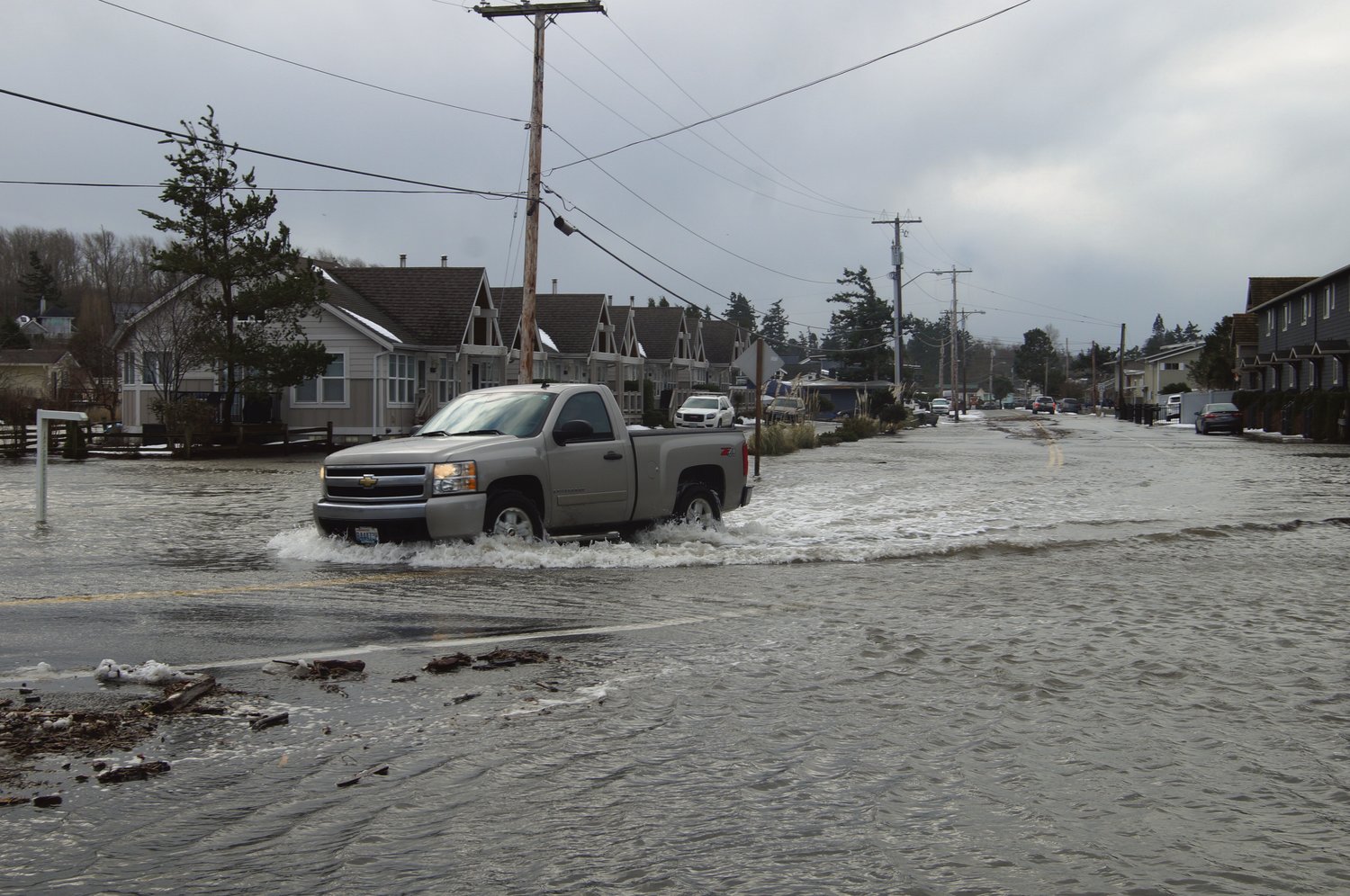 King tide, storm pressure and waves up to 4 feet tall flood south Birch Bay Drive on January 7.