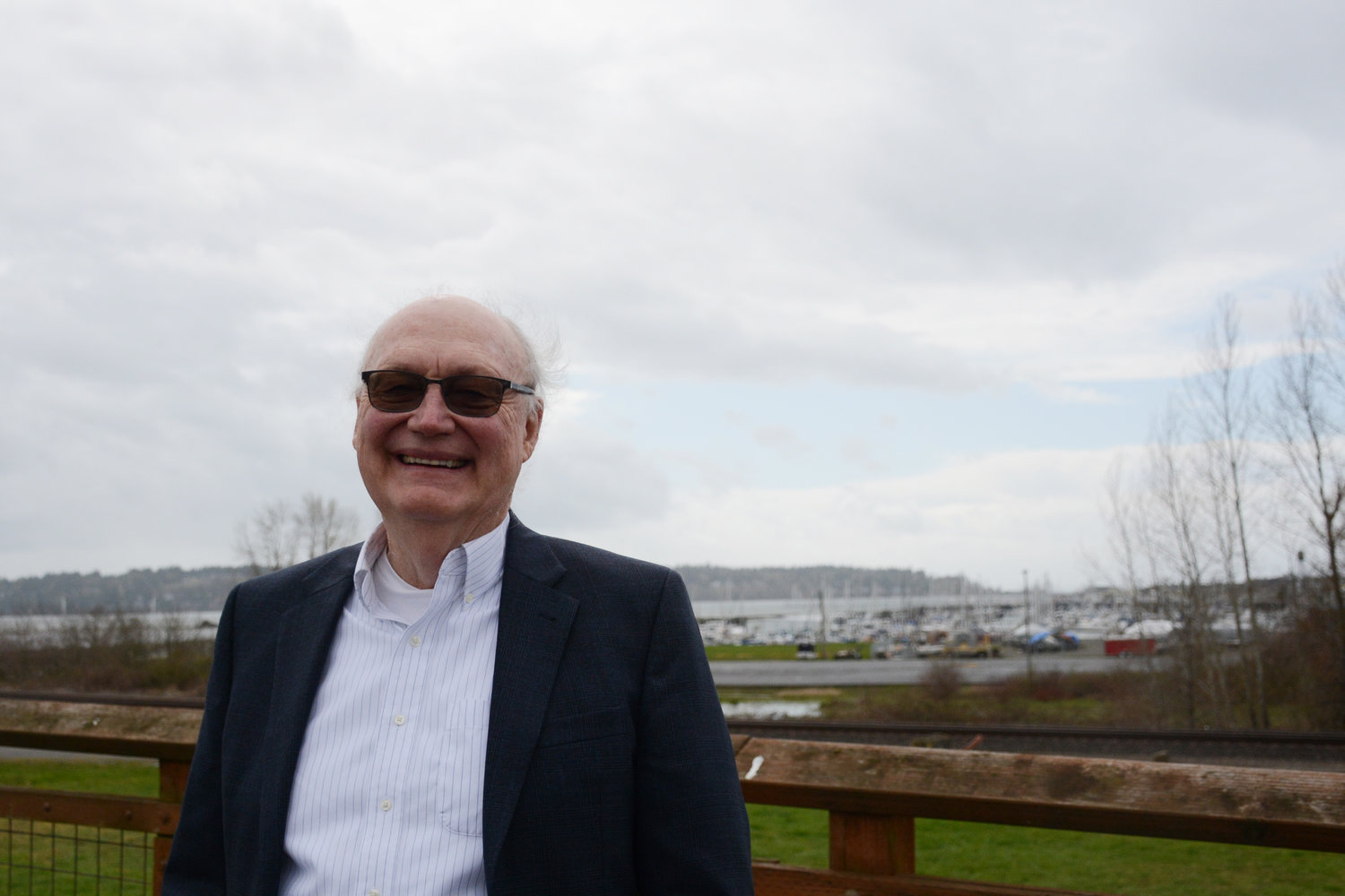 New Blaine school board member Don Leu stands in front of Blaine Harbor. Leu has worked in education for 52 years.