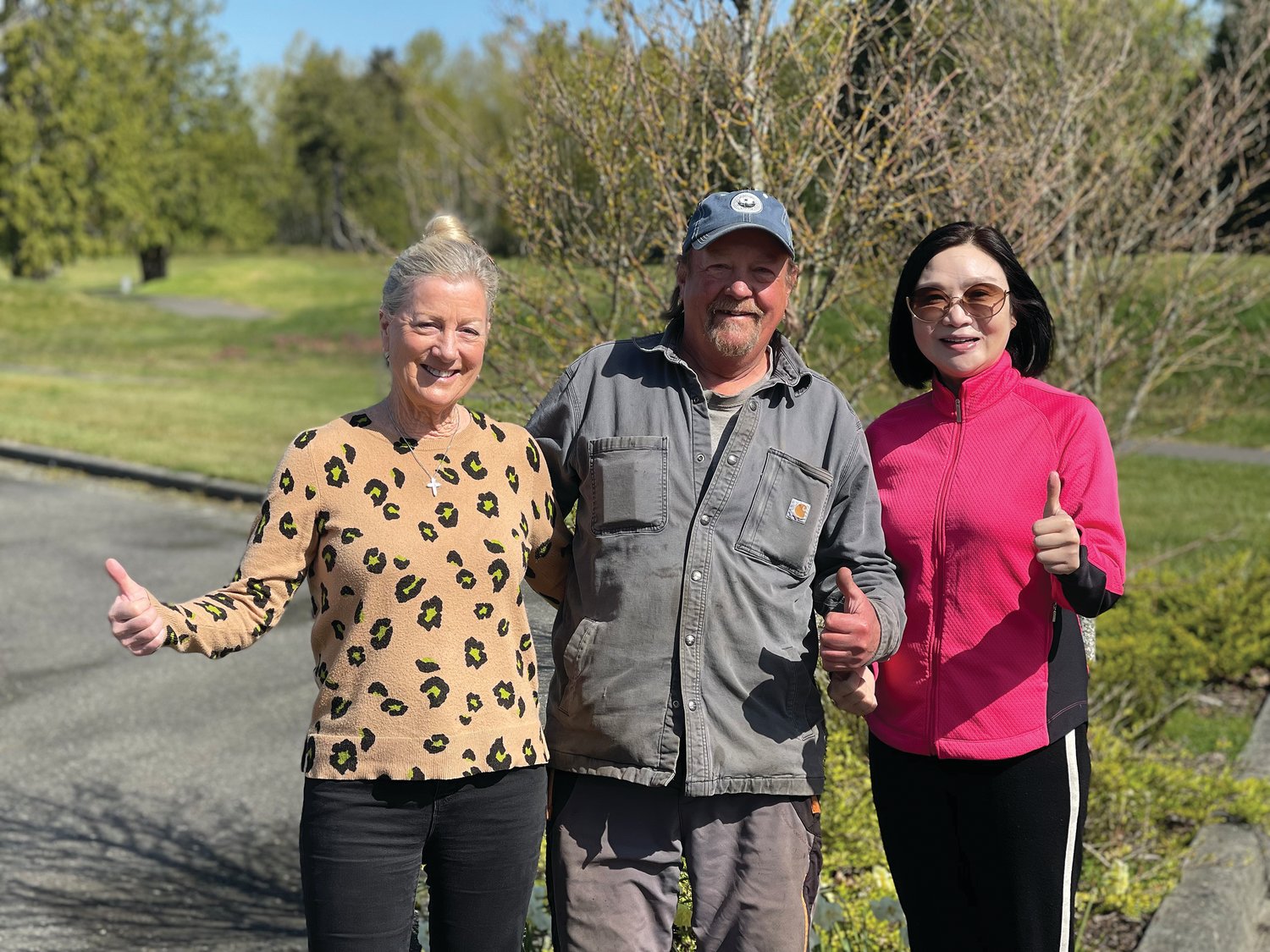 The crews are hard at work getting the Bald Eagle Golf Club in Point Roberts ready to invite eager golfers back this summer to the best-drained golf course in the Lower Mainland. From l., general manager Tracy Evans, maintenance manager Rick Hoole and owner Coco Luo offer a thumbs up.