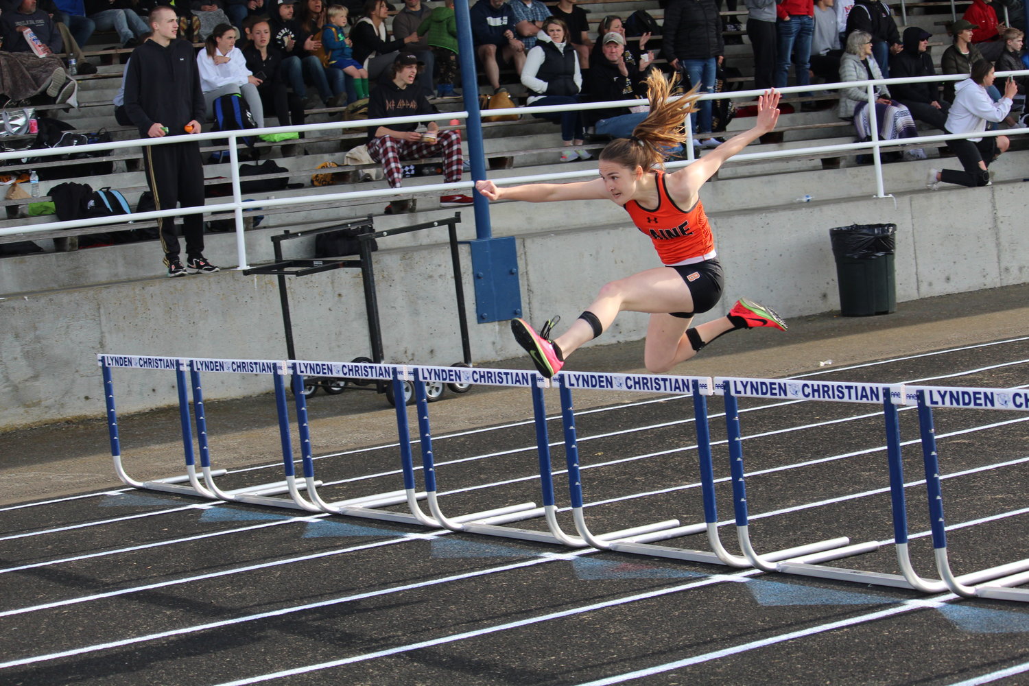 Eleeshiyah Faulkner in the 300-meter hurdles at the 1A district championship meet at Lynden Christian High School on May 13.