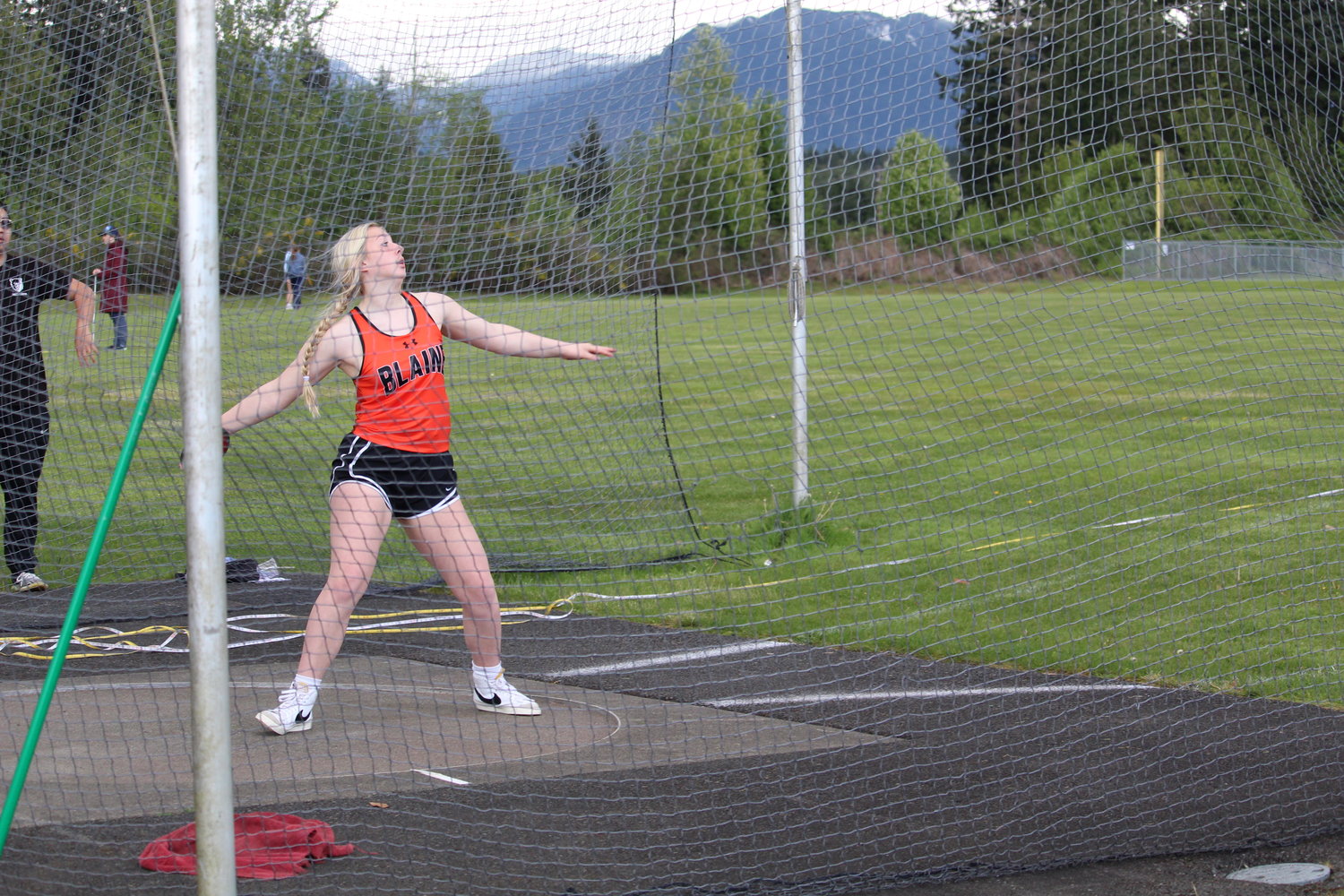 Deja Dube threw a personal record of 96’ 1” in the discus May 20 to take fourth and qualify for the state meet.