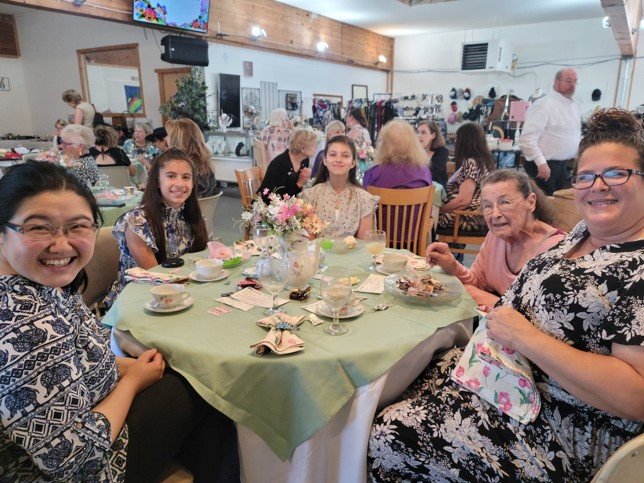 The Bridge sold out its Ladies Tea and Fashion Show on July 9. The show featured clothing from the Bridge’s boutique.
