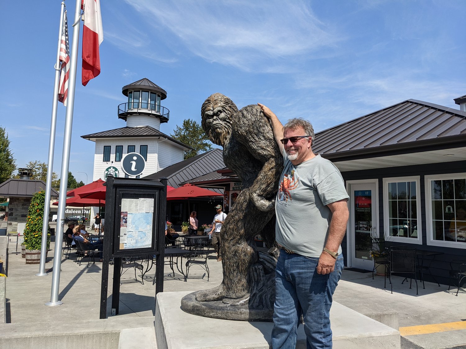 Hill's Chevron owner Mike Hill with his new Sasquatch statue.