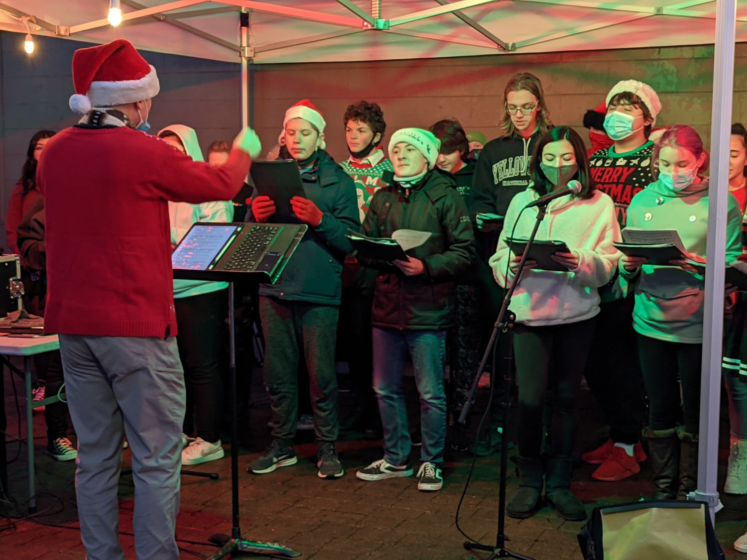 Carolers sing during the 2021 Holiday Harbor Lights.