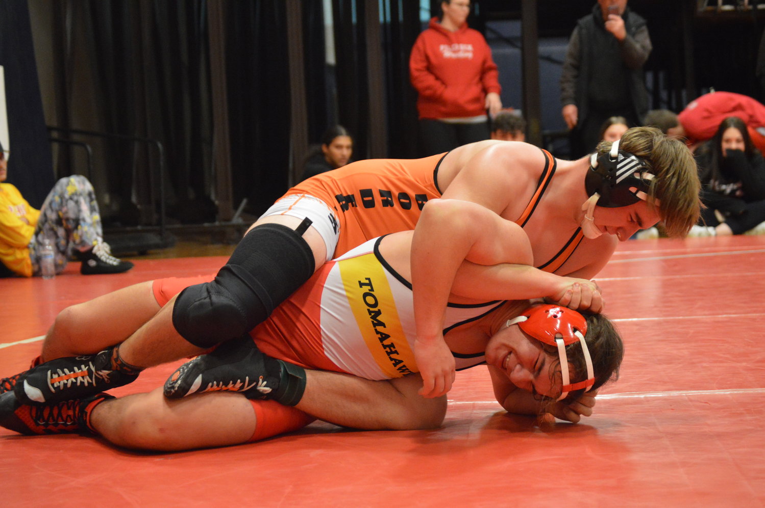 Jackson Veals on top of his opponent at the Mariner Holiday tournament December 3 in Everett.
