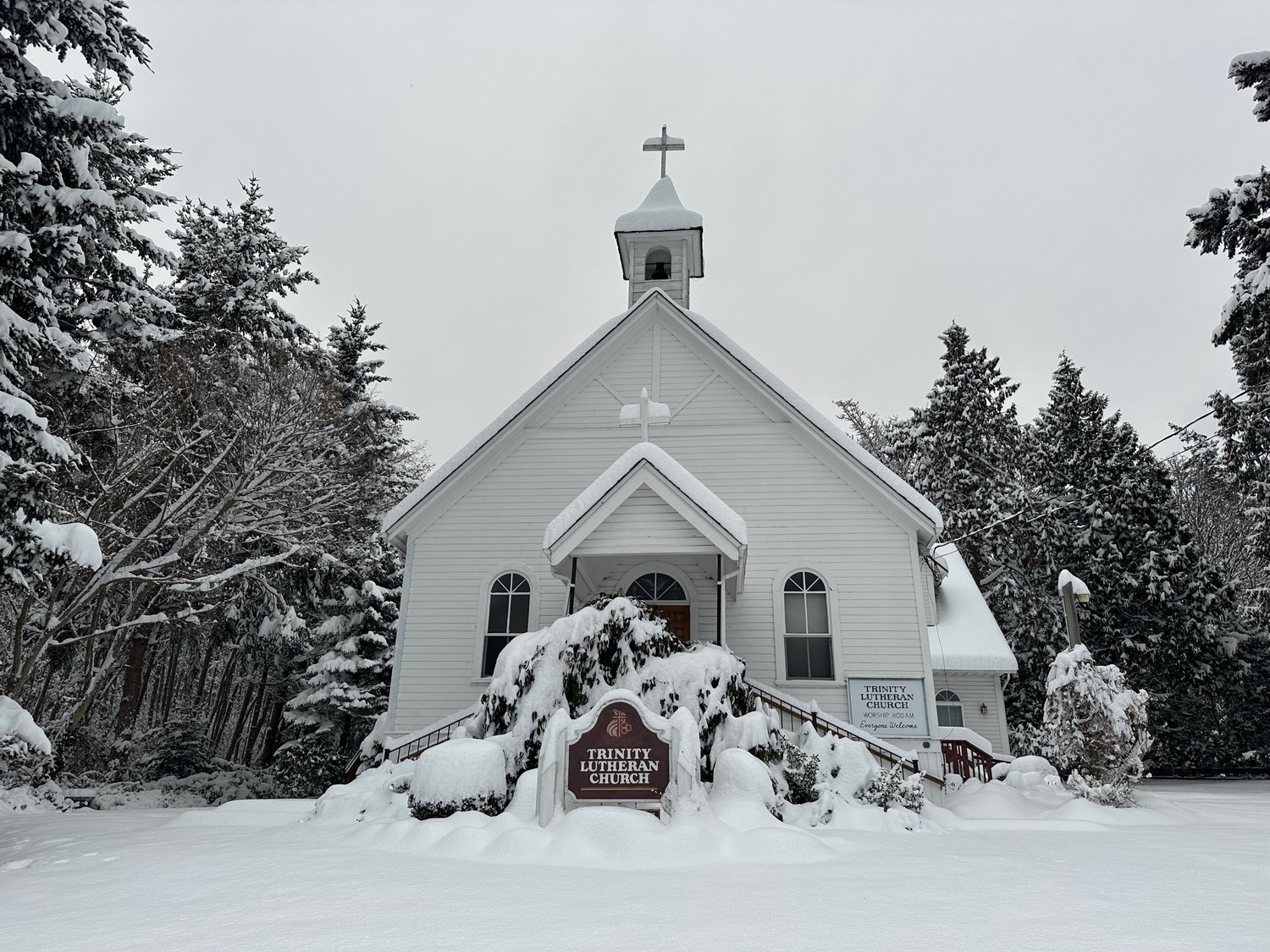 Trinity Lutheran Church on APA Road sat still and quiet on Tuesday, December 20 following a heavy snowstorm that struck the Pacific Northwest. The community is invited to Christmas services on December 25 at 11 a.m.