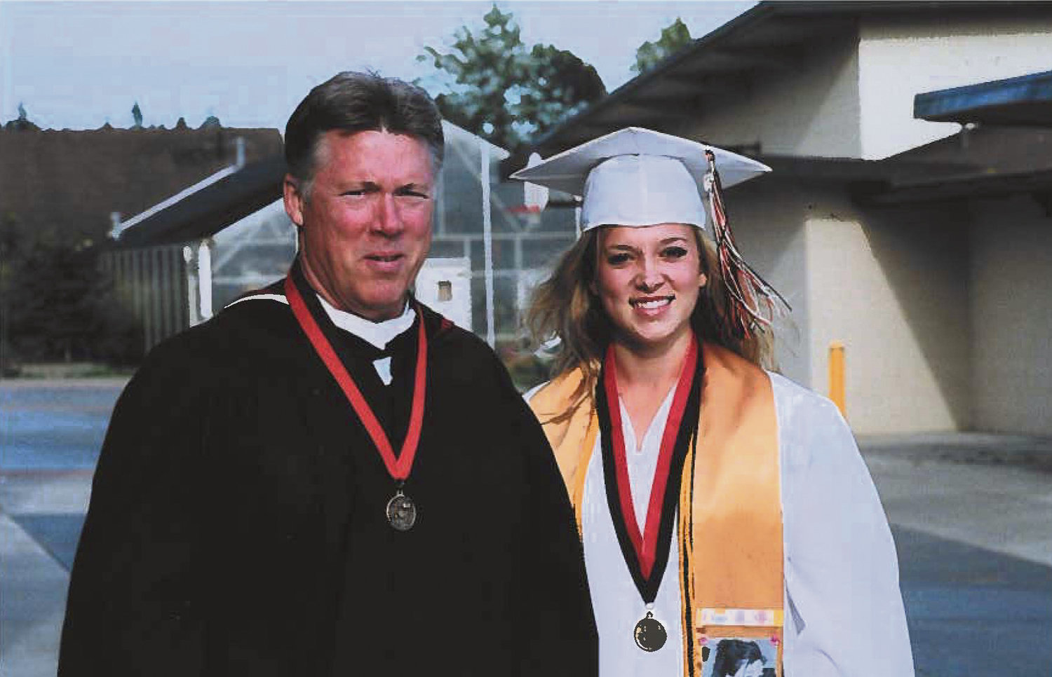 Neil Nix, l., and daughter Mackenzie Nix at graduation in 2007.