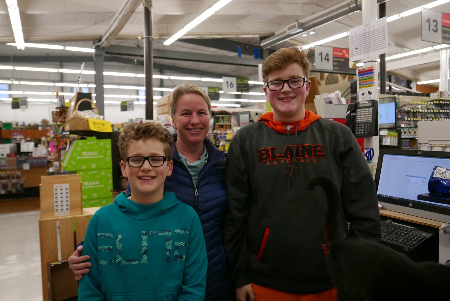Kimberly Akre with her sons Mason, l., and Tobin, at Pacific Building Center in 2018.