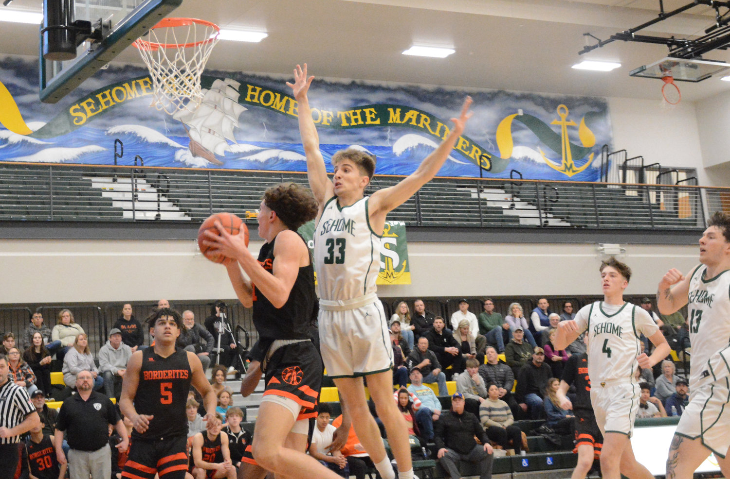 Lucas Smith goes up for a layup in Blaine’s 60-49 loss at Sehome High School January 31. Smith finished with 18 points.
