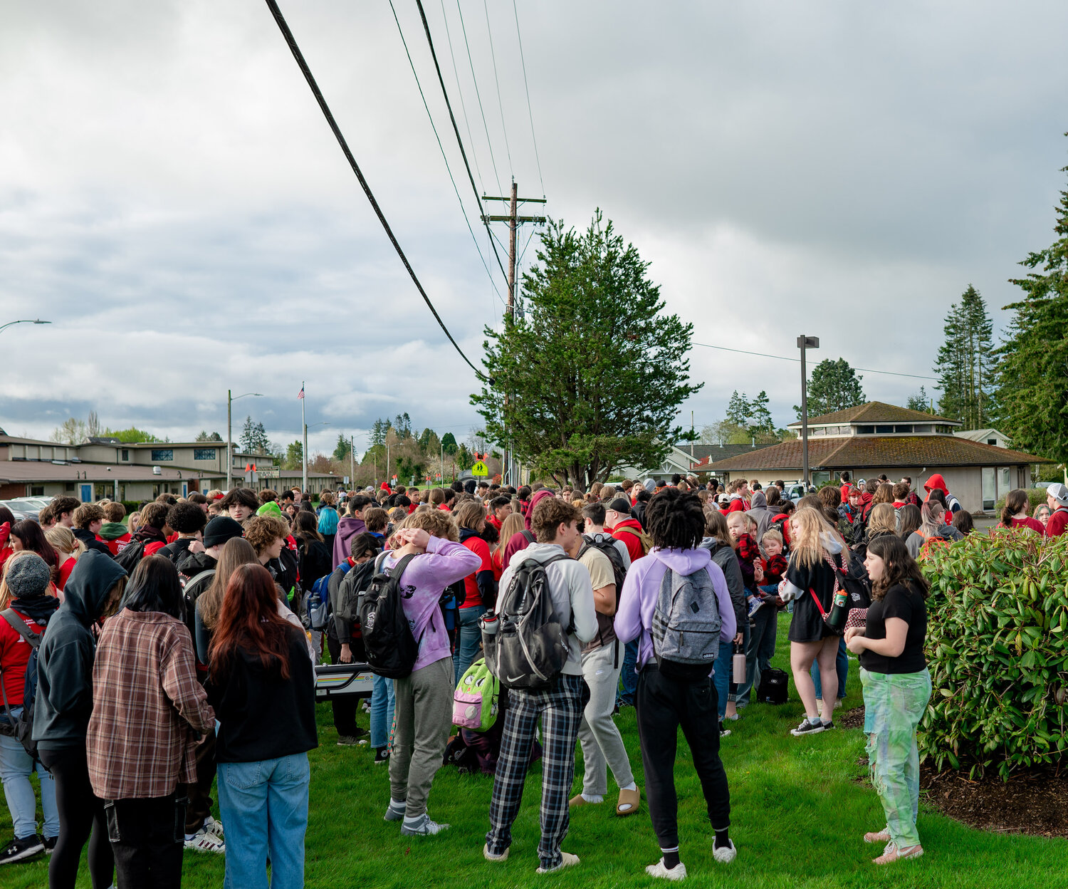 A crowd of students gathered in front of the Blaine school district office during an April 24 walkout to protest the district’s plans to cut about 65 part-time and full-time employees, including teachers, paraeducators, librarians and staff from administration, food service and transportation. The district says the reduced education plan, which the school board approved 4-0 with one abstention, is mainly due to a smaller-than-projected student enrollment and decreased government funding.