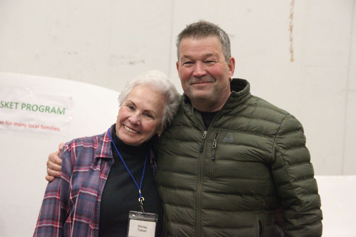 CAP Thanksgiving Basket program director Shirley Tobian, l., and longtime volunteer Mike Nelson.