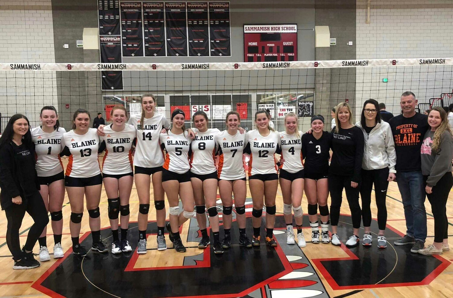 Blaine volleyball coach Jacquie Smith, r., with the 2018 Borderite volleyball team that broke a 20-year state playoff drought. The varsity team placed 9th and earned Smith the 2019 Blaine coach of the year award. Smith spent the past decade coaching Blaine varsity, junior varsity and middle school volleyball.