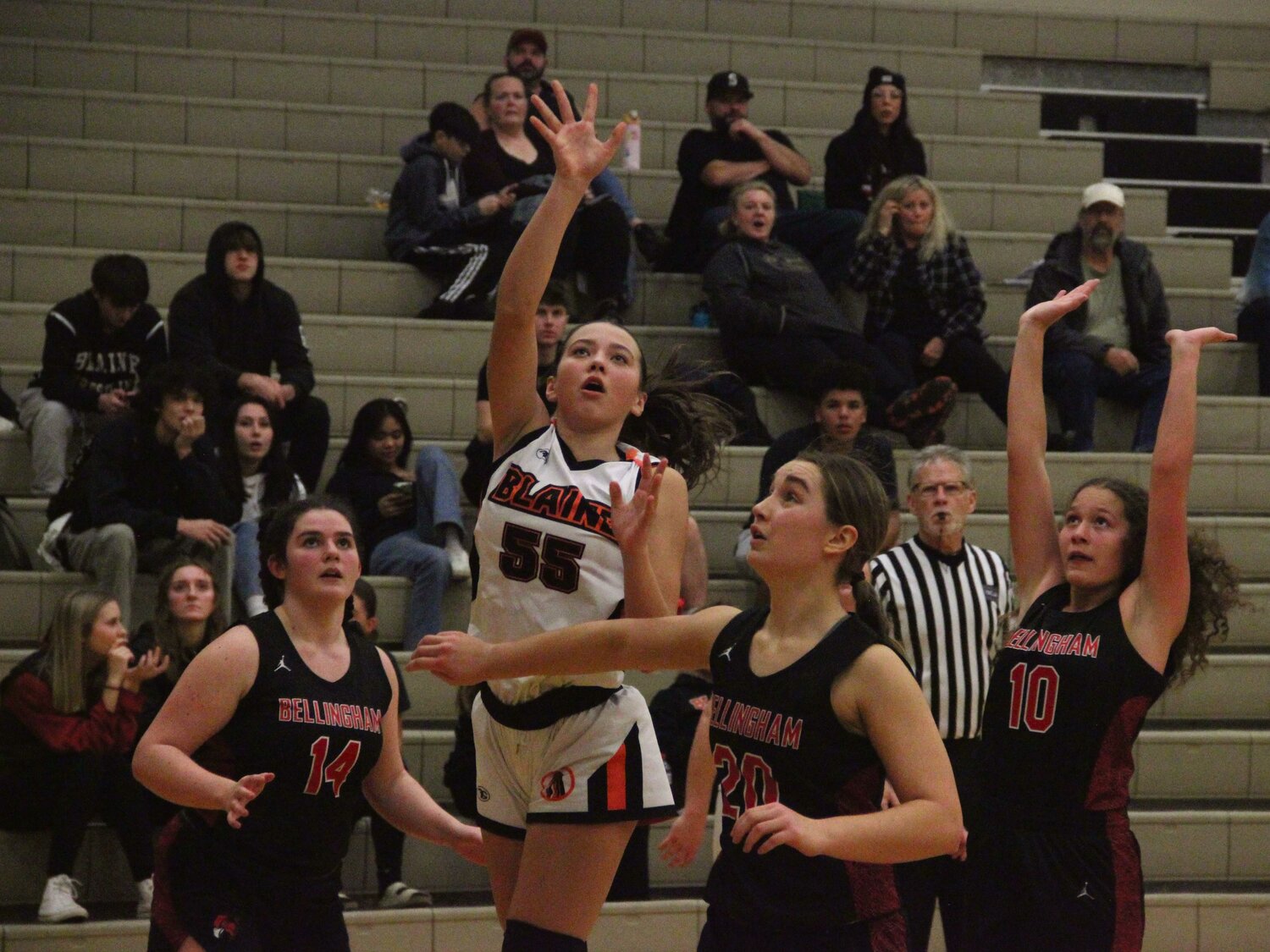 Freshman Teia Dube shoots a floater surrounded by three Bellingham defenders in the third quarter of Blaine’s 53-30 win over Bellingham on December 5.